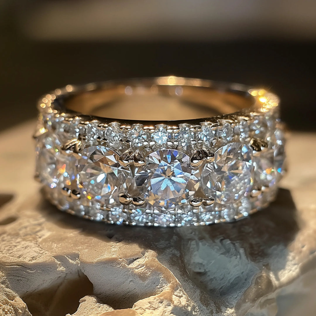 A close-up view of an exquisite anniversary ring from RUDIX JEWELLERY, featuring multiple sparkling diamonds set in a luxurious gold band.