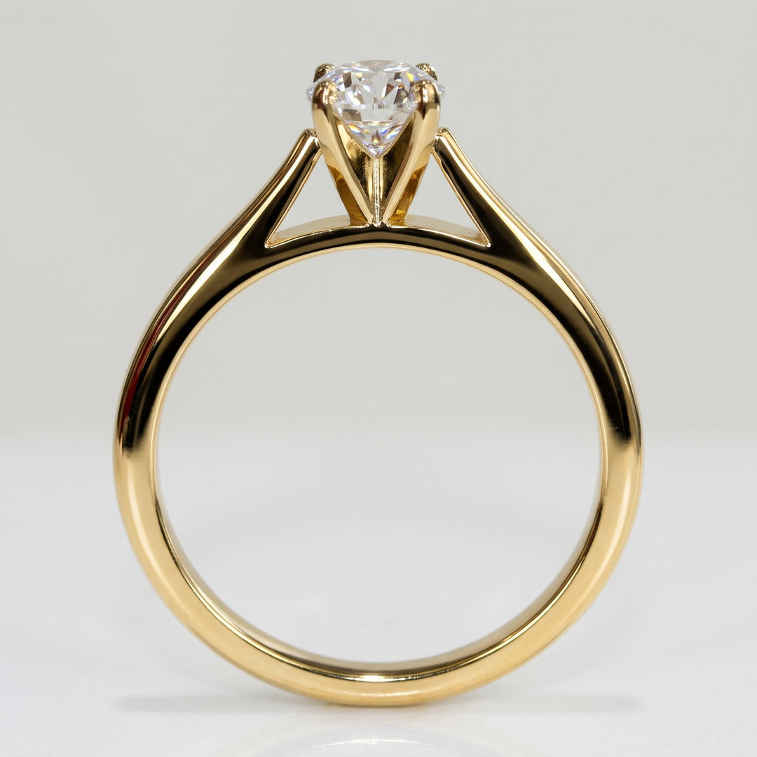 0.56 Ct Round Natural Diamond Solitaire Engagement Ring in 14K Yellow Gold — View 4
