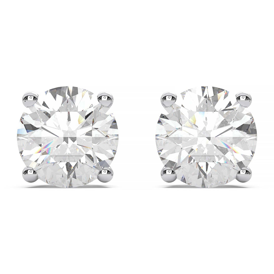 Close-up of 1 carat total round lab-grown diamond stud earrings in a four-prong basket setting.