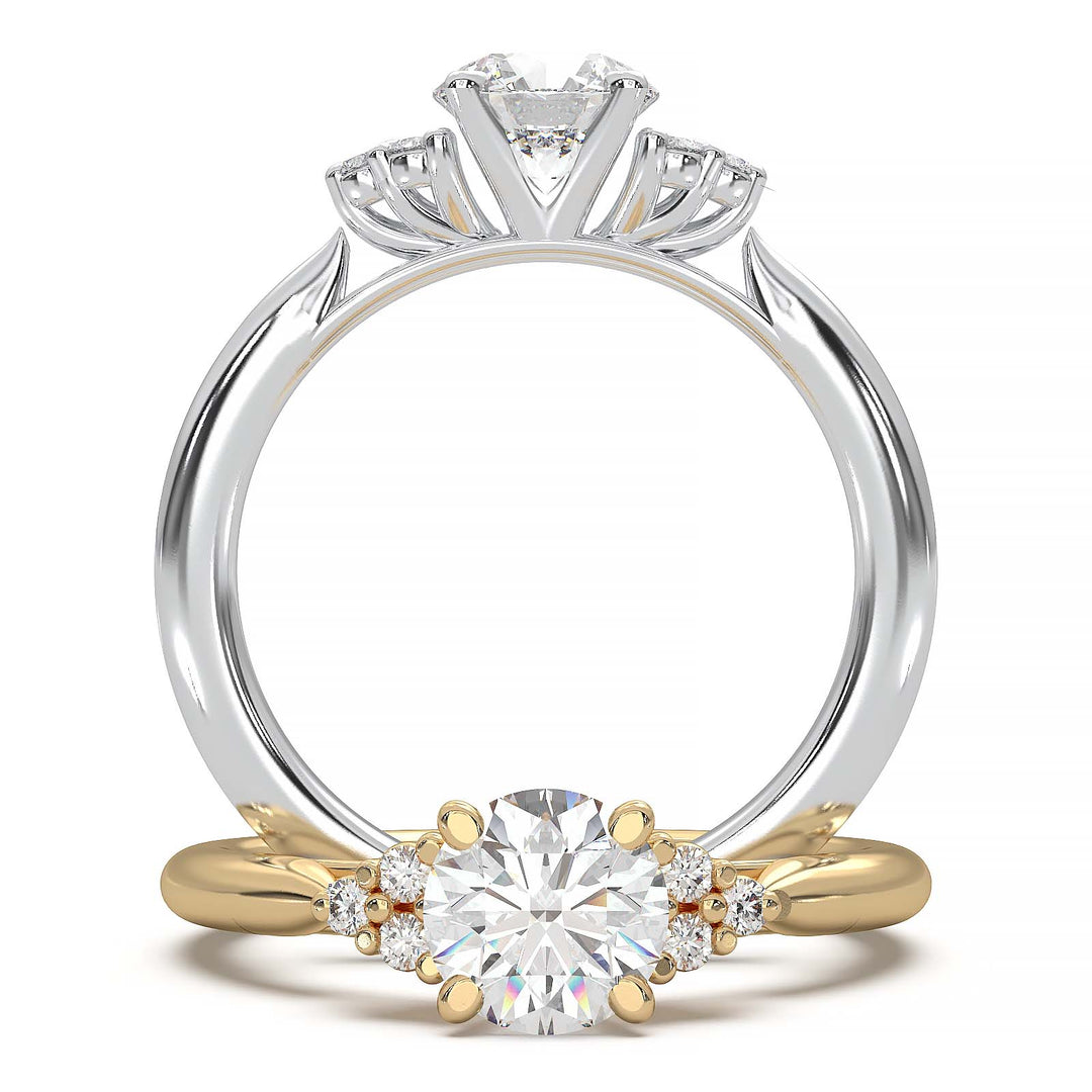 Round lab-grown diamond cluster engagement ring with a low-profile setting and accent diamonds.