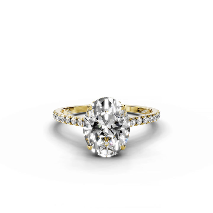 Oval diamond ring, cathedral pavé style, yellow gold.