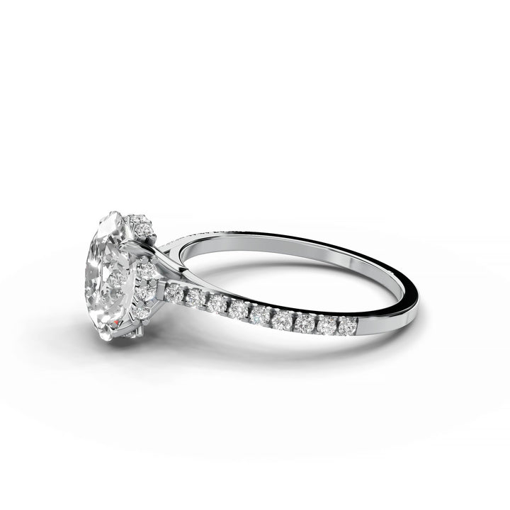 Oval diamond ring, hidden halo, cathedral pavé band, white gold