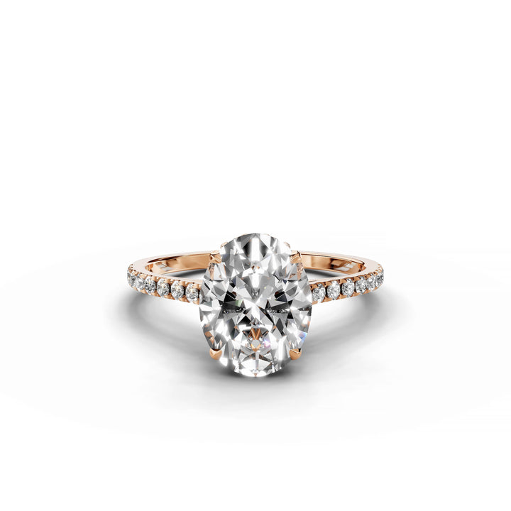 Oval diamond ring, hidden halo, cathedral pavé band, rose gold.