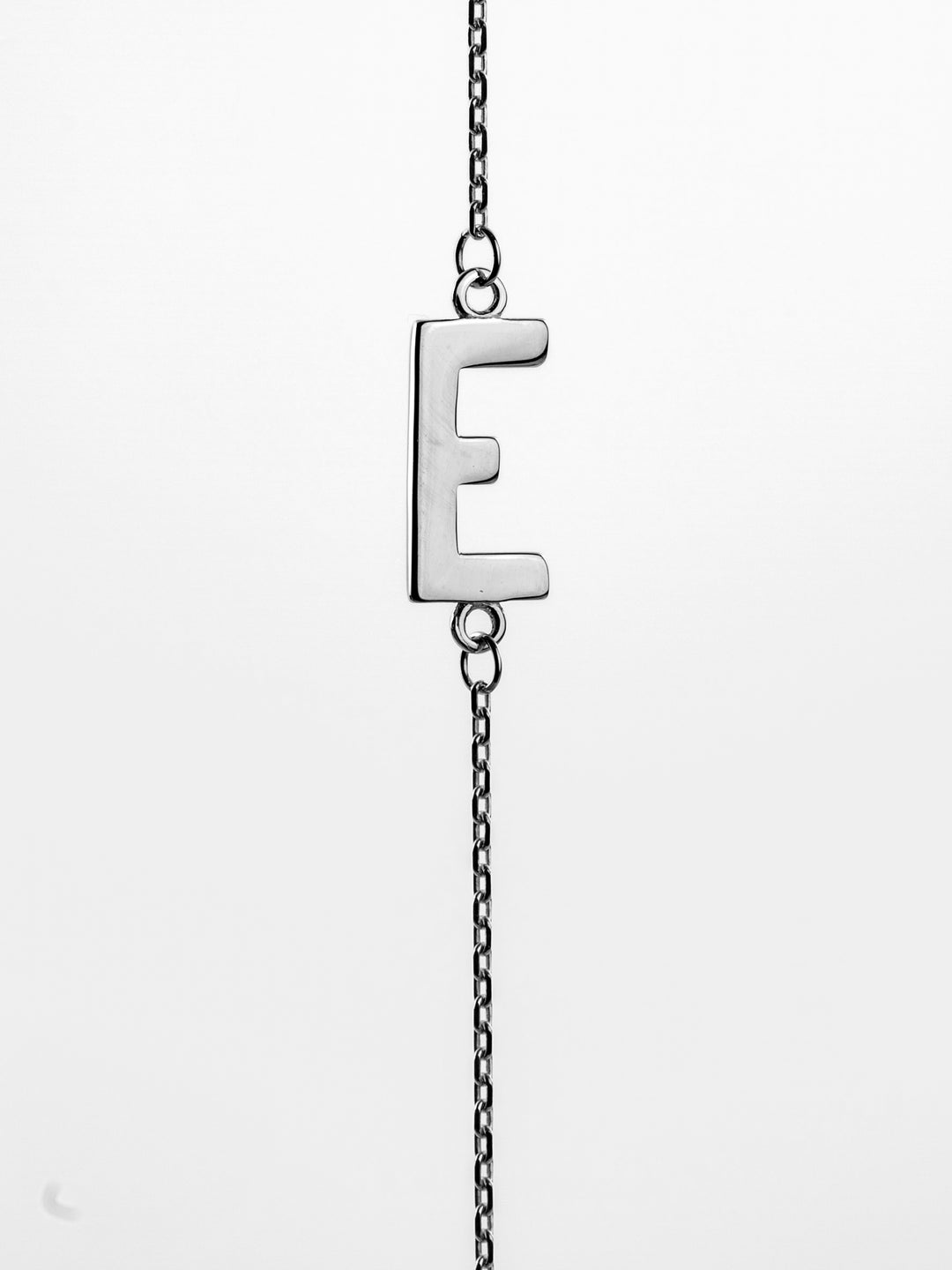 10K White Gold Sideways Initial E Necklace — product photo