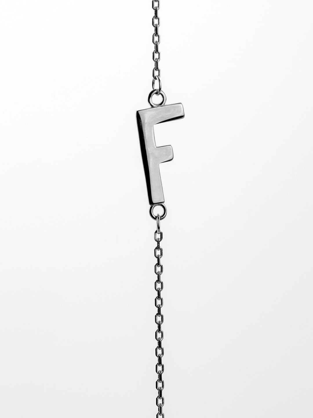 10K White Gold Sideways Initial F Necklace — product photo