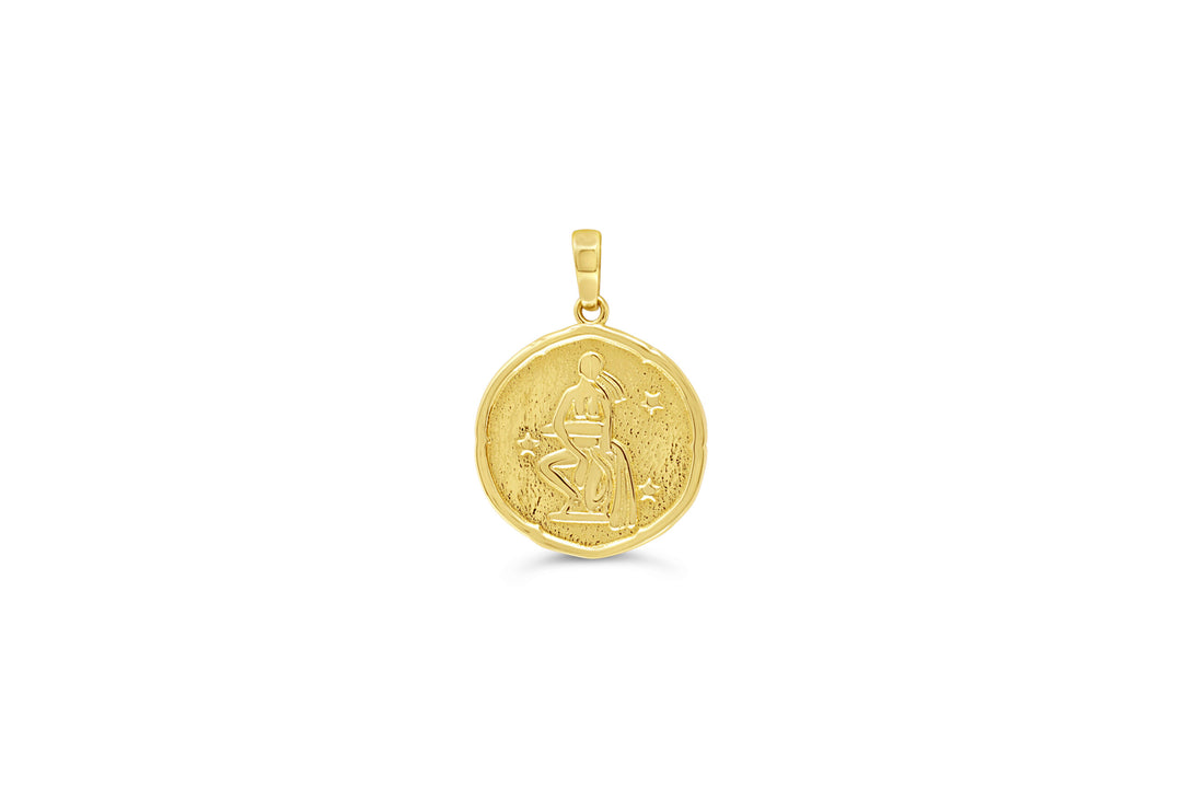 10K yellow gold Aquarius zodiac pendant: a round medallion with the water-bearer pouring from an urn raised in polished gold and small stars on a textured background