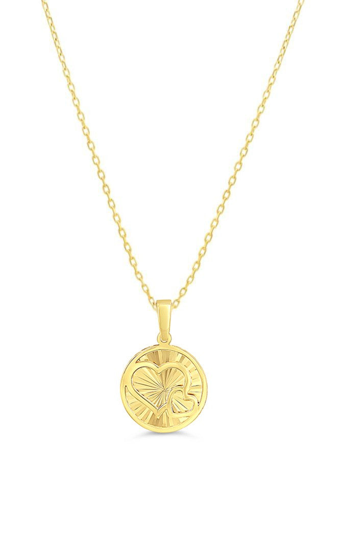10K yellow gold round medallion pendant with diamond-cut hearts (shown on a chain; chain not included)