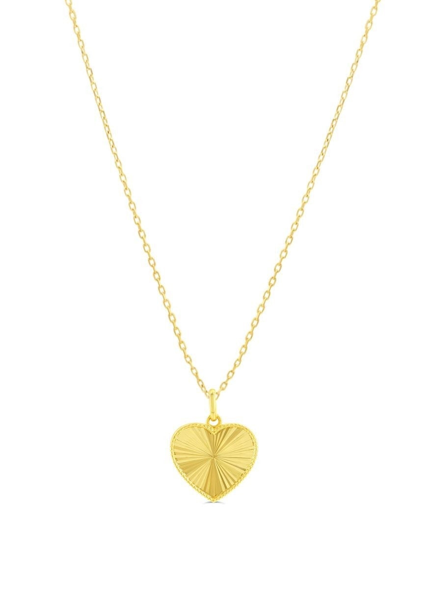 10K yellow gold diamond-cut sunburst heart pendant (shown on a chain; chain not included)