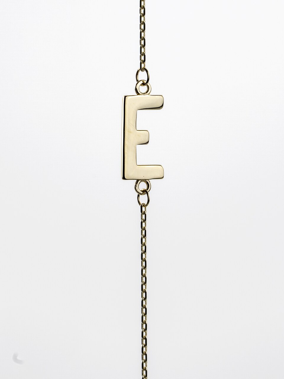 10K Yellow Gold Sideways Initial E Necklace — product photo