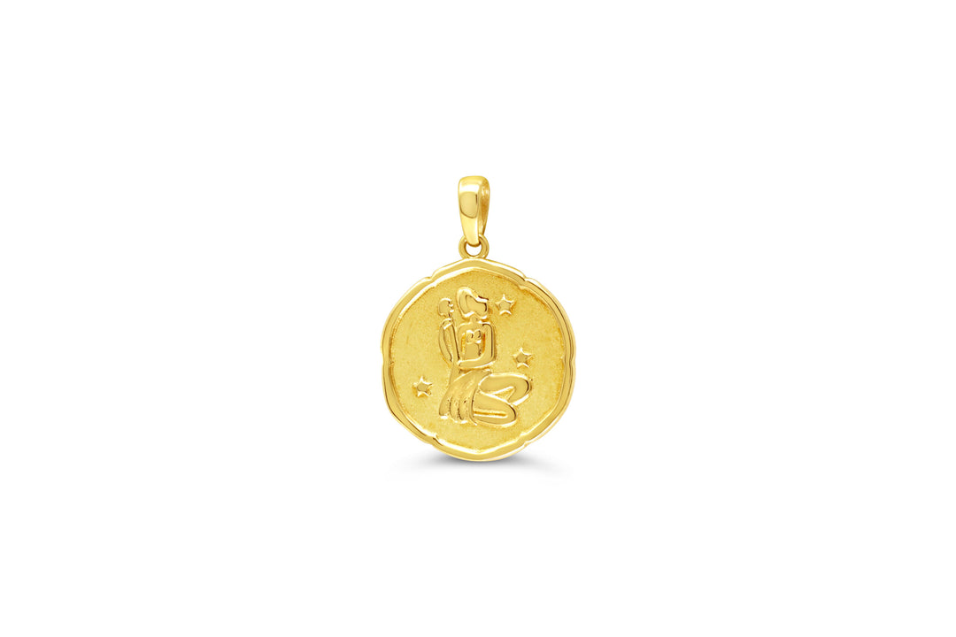 10K yellow gold Virgo zodiac pendant: a round medallion with a kneeling maiden holding a stalk of wheat raised in polished gold and small stars on a textured background