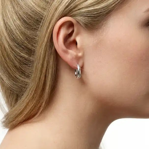 White Gold Oval Huggie Earrings - worn on ear