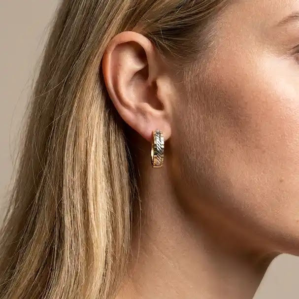 Two Tone Patterned Huggie Earrings - worn on ear
