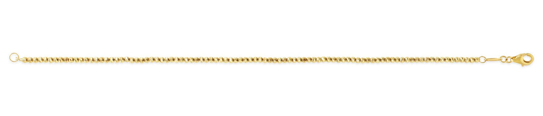 10k yellow gold ball bracelet with delicate chain, 7 inches long.