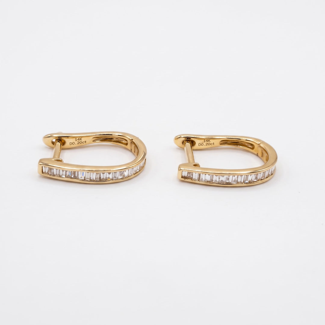 Inside of the 14k yellow gold huggies showing the 14K D0.20ct stamp