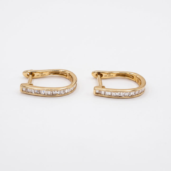 Inside of the 14k yellow gold huggies showing the 14K D0.20ct stamp