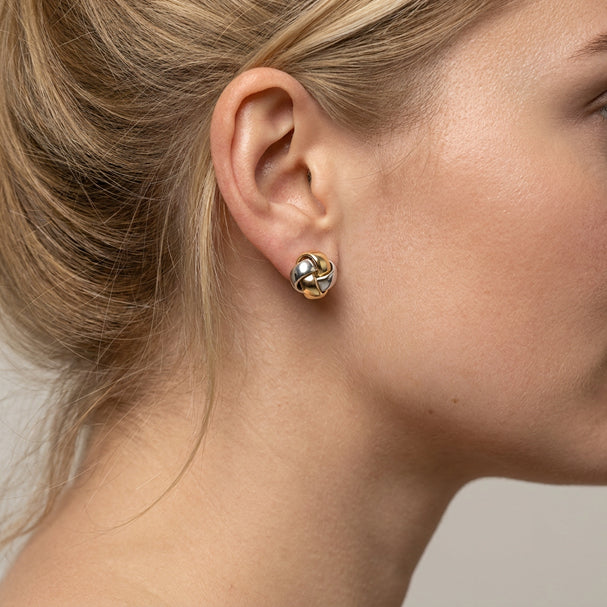 Two Tone Love Knot Stud Earrings - worn on ear