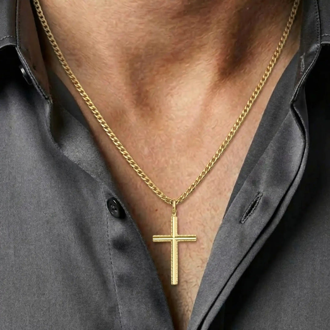 Minimal Latin Yellow Gold Cross Pendant worn on mens chest