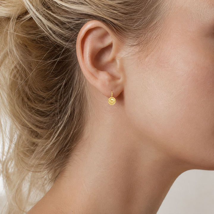 Yellow Gold High Polish French Back Ball Earrings - worn on ear