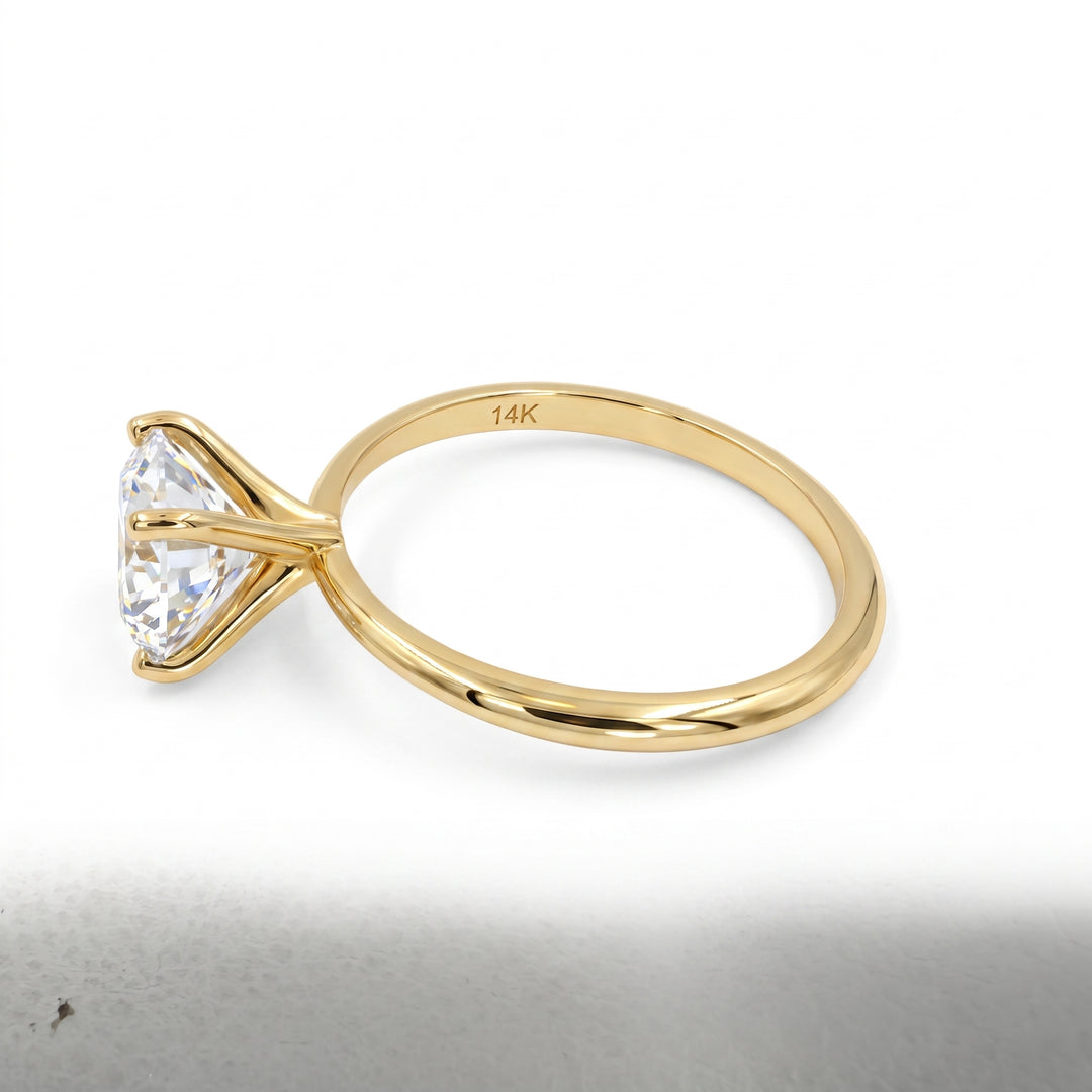 14K yellow gold 1.48 ct round colourless moissanite solitaire ring profile view