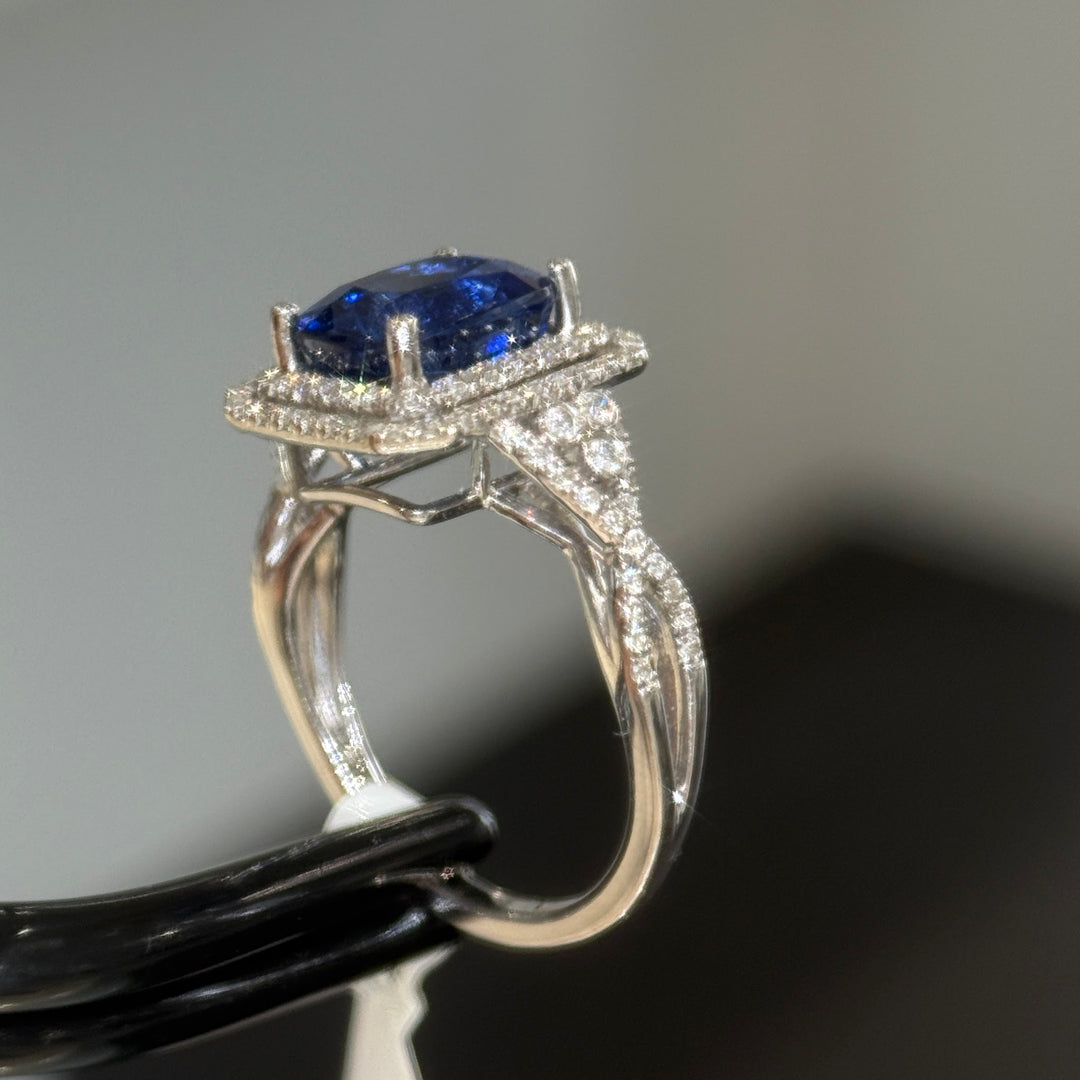 3.83ct blue sapphire halo ring, diamond-set crossover shank in 14K white gold