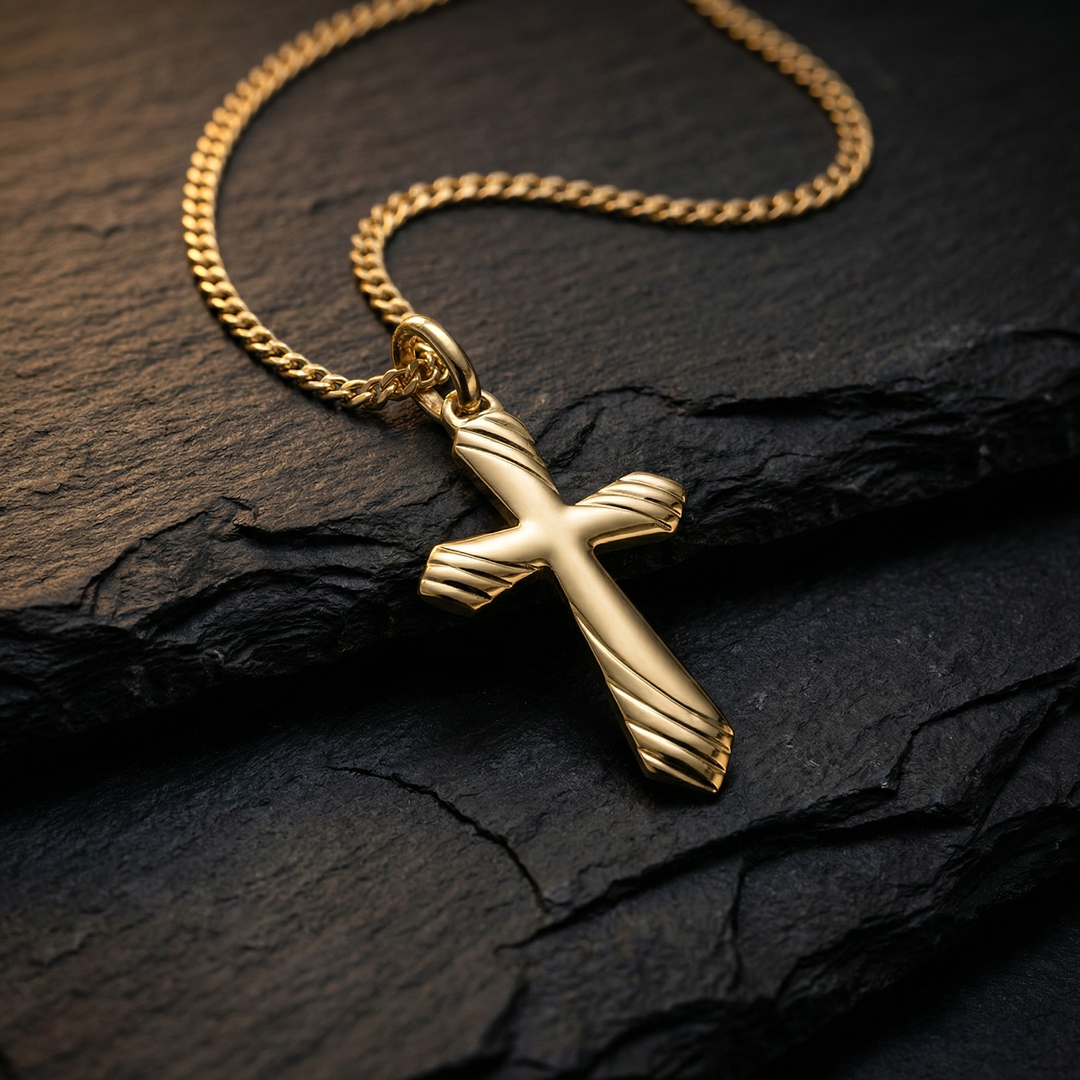 Textured Latin Yellow Gold Cross Pendant on stone