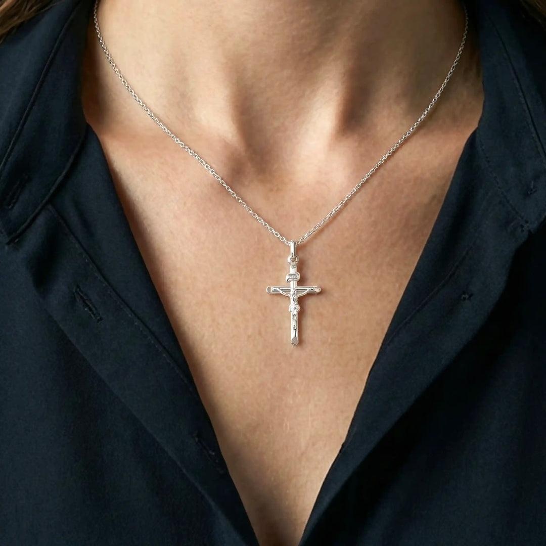 Latin Crucifix White Gold Cross Pendant worn on womens chest