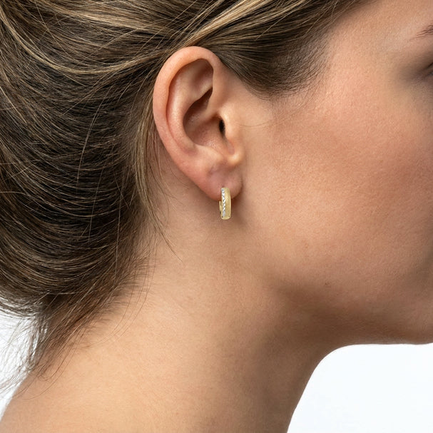 Two Tone Patterned Huggie Earrings - worn on ear