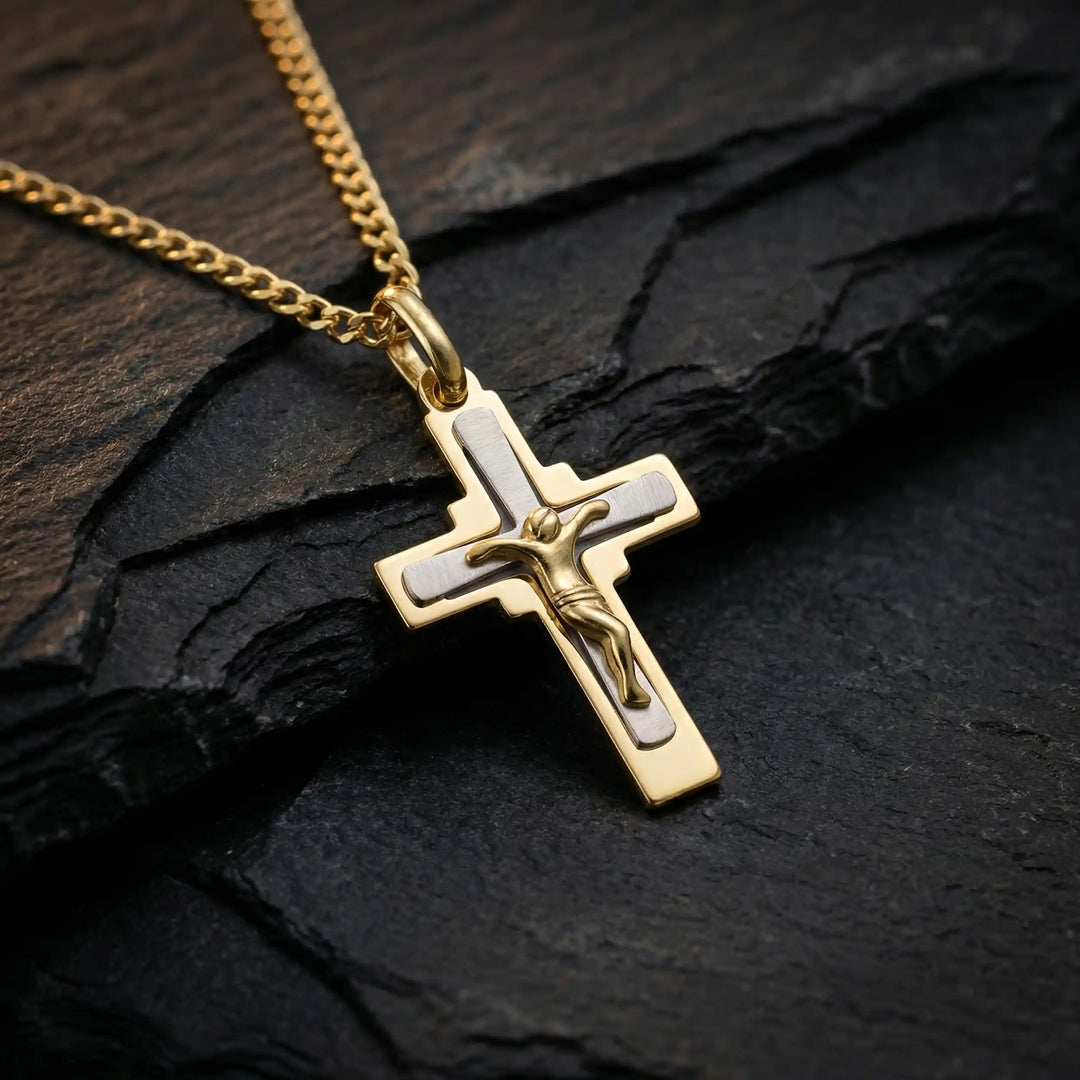 Stepped Crucifix Two-Tone Gold Cross Pendant on stone