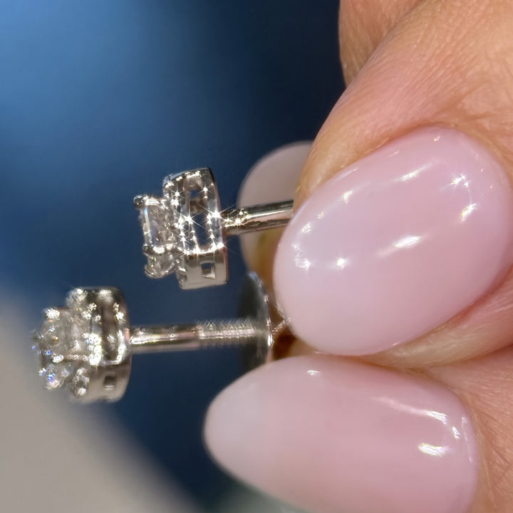 10k white gold lab diamond halo studs in hand, side view