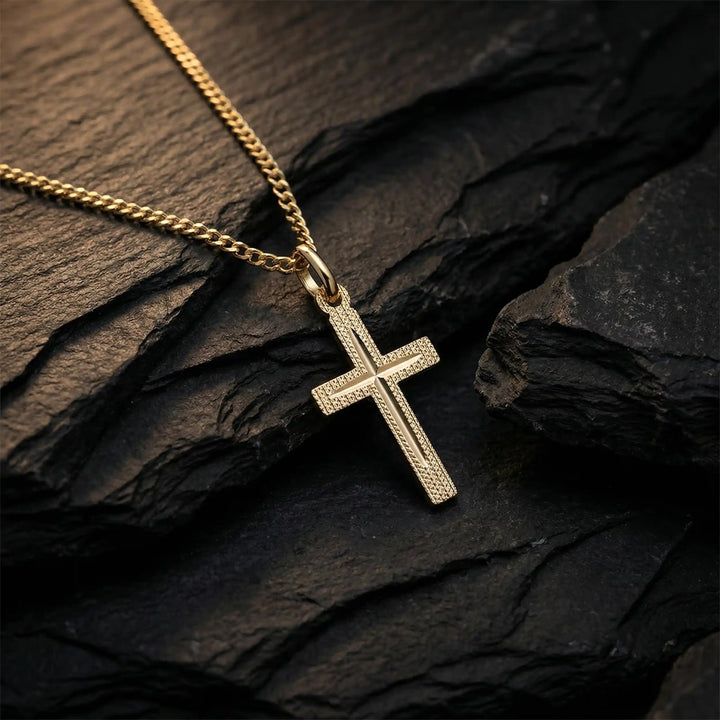 Textured Latin Yellow Gold Cross Pendant on stone