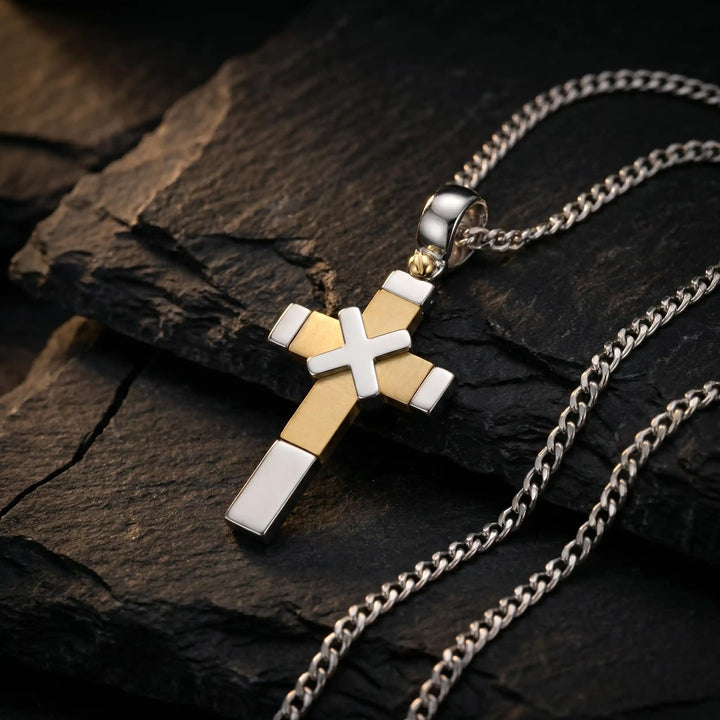 Modern Latin Two-Tone Gold Cross Pendant on stone