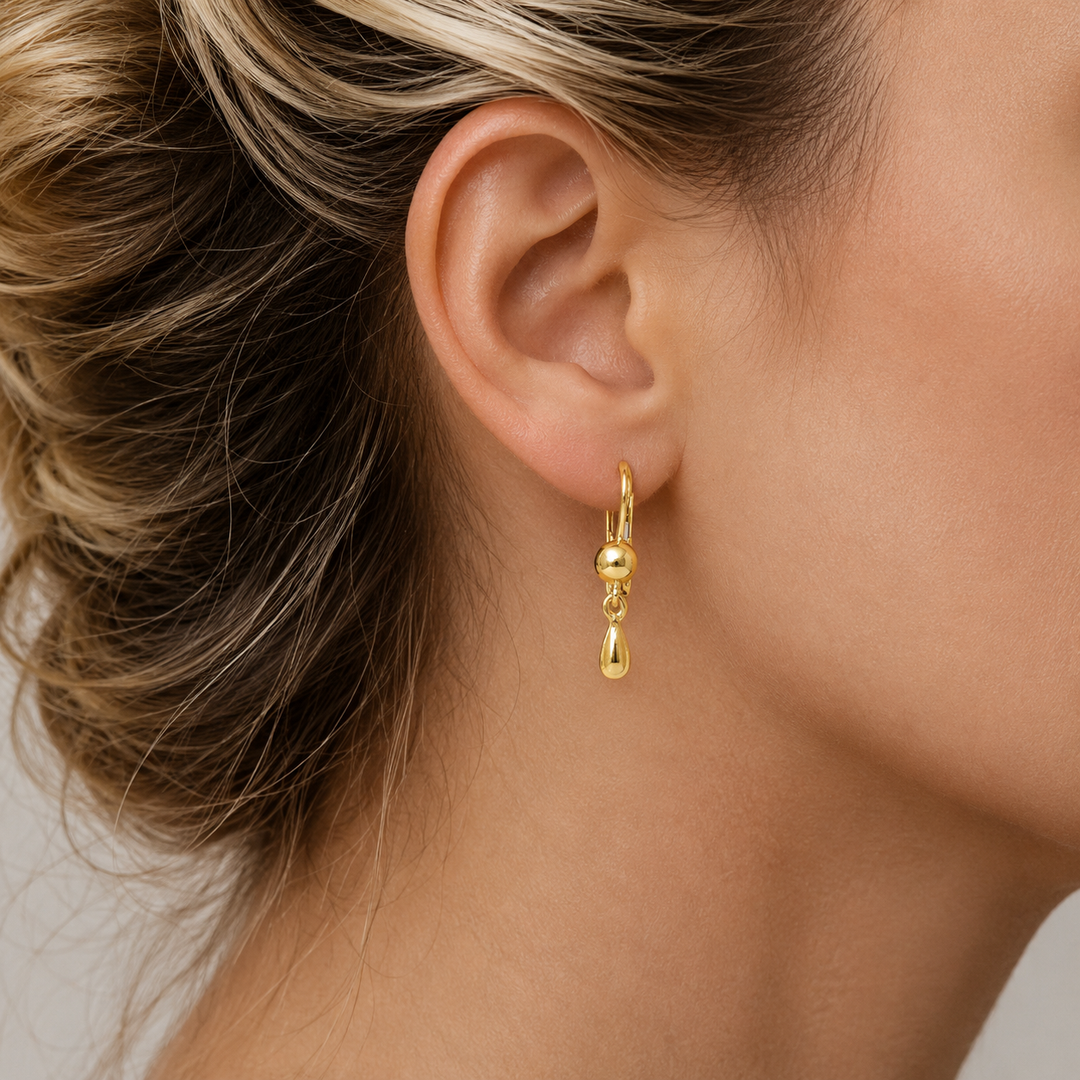 Yellow Gold High Polish Tear Drop Earrings - worn on ear