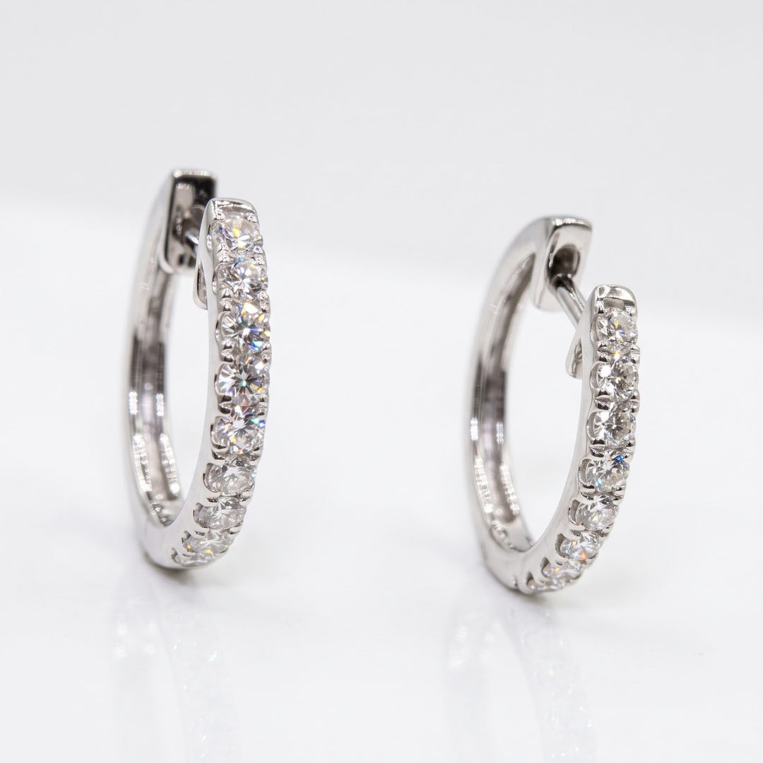 RUDIX 18k white gold natural diamond huggie hoop earrings — pair standing front view, both parallel on white studio background