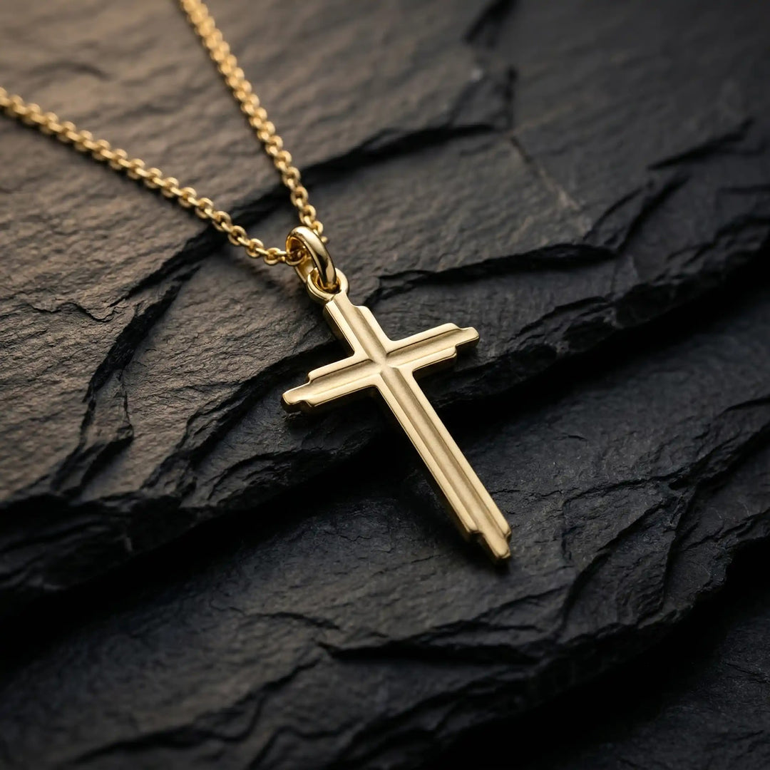 Stepped Latin Yellow Gold Cross Pendant on stone
