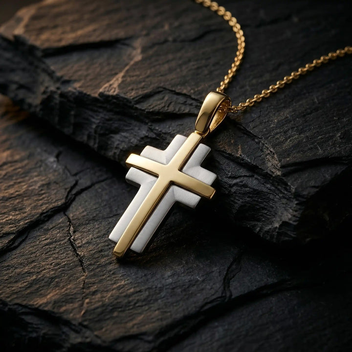 Layered Latin Two-Tone Gold Cross Pendant on stone