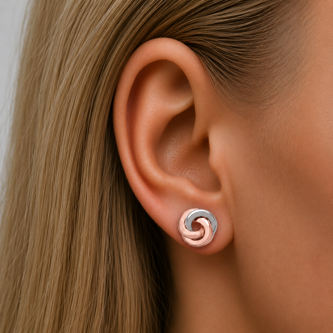 Pink And White Gold Love Knot Stud Earrings - worn on ear