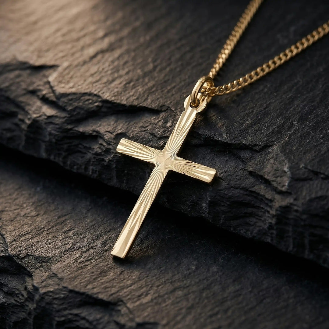 Diamond-Cut Latin Yellow Gold Cross Pendant on stone