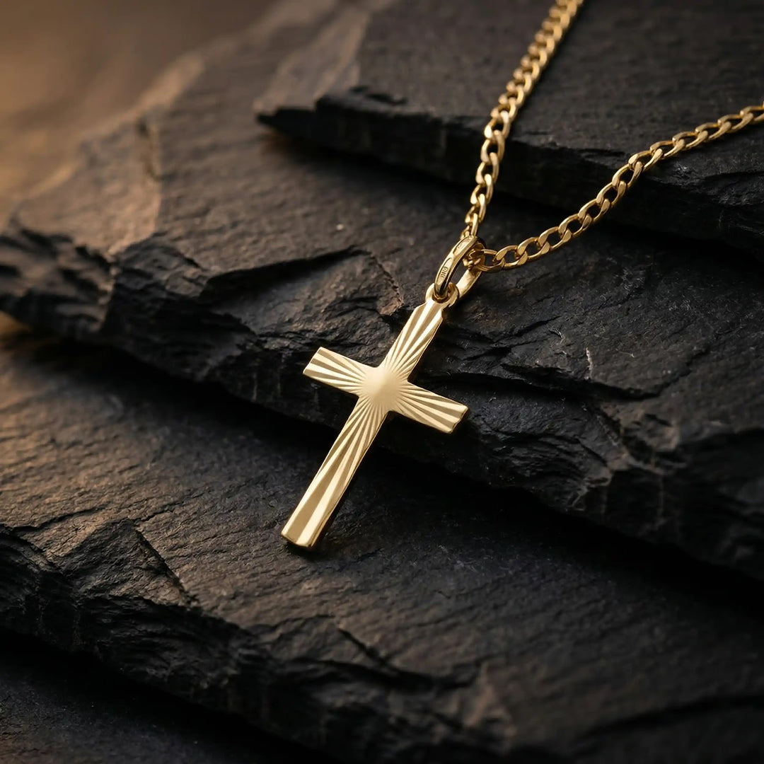Sunburst Latin Yellow Gold Cross Pendant on stone