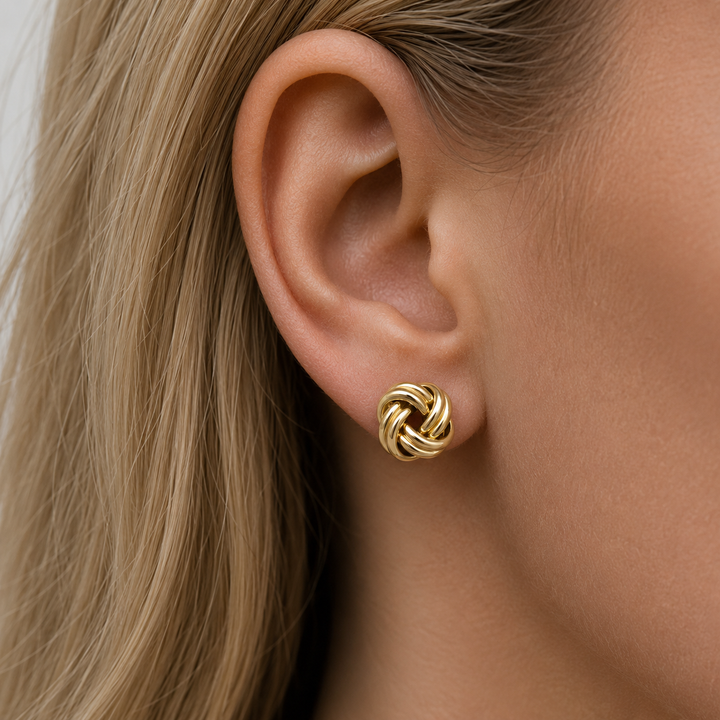 Yellow Gold Love Knot Stud Earrings - worn on ear