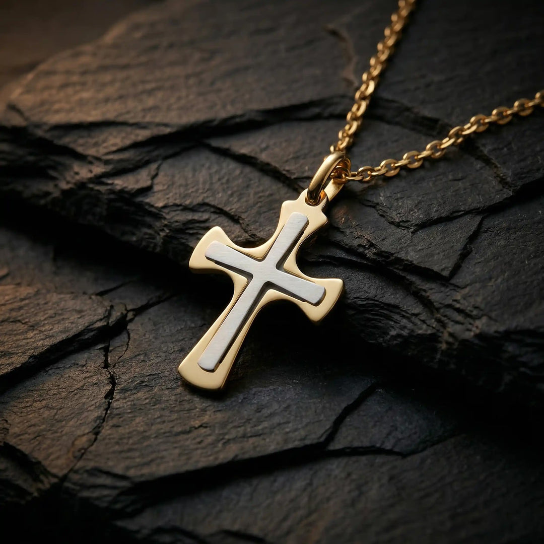 Layered Pattee Two-Tone Gold Cross Pendant on stone