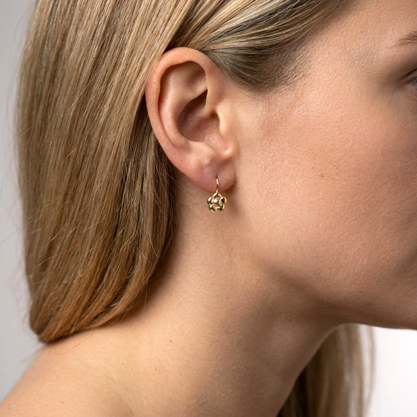 Yellow Gold Flower Shape French Back Earrings - worn on ear