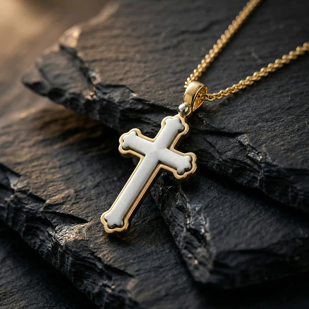 Budded Latin Two-Tone Gold Cross Pendant on stone