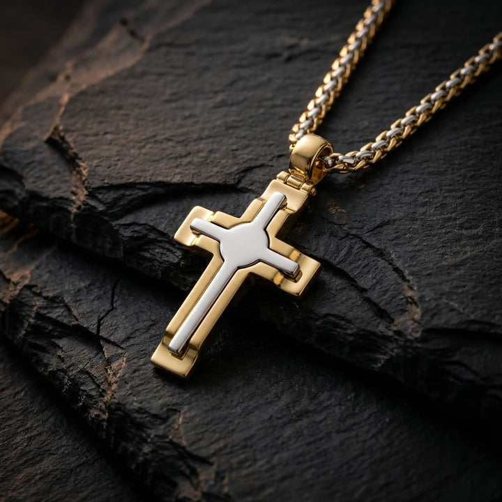Two-Tone Latin Two-Tone Gold Cross Pendant on stone