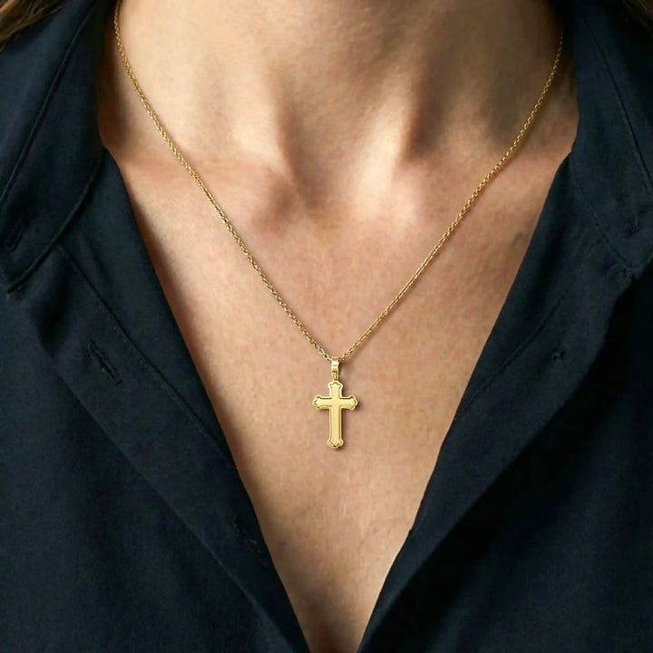Budded Latin Yellow Gold Cross Pendant worn on womens chest