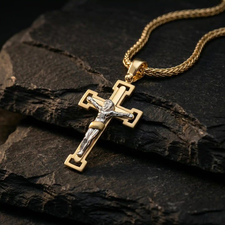 Two-Tone Crucifix Two-Tone Gold Cross Pendant on stone