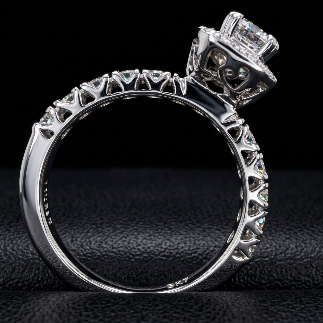 1.03 CT emerald-cut diamond halo engagement ring in 14K white gold with natural diamond accents.