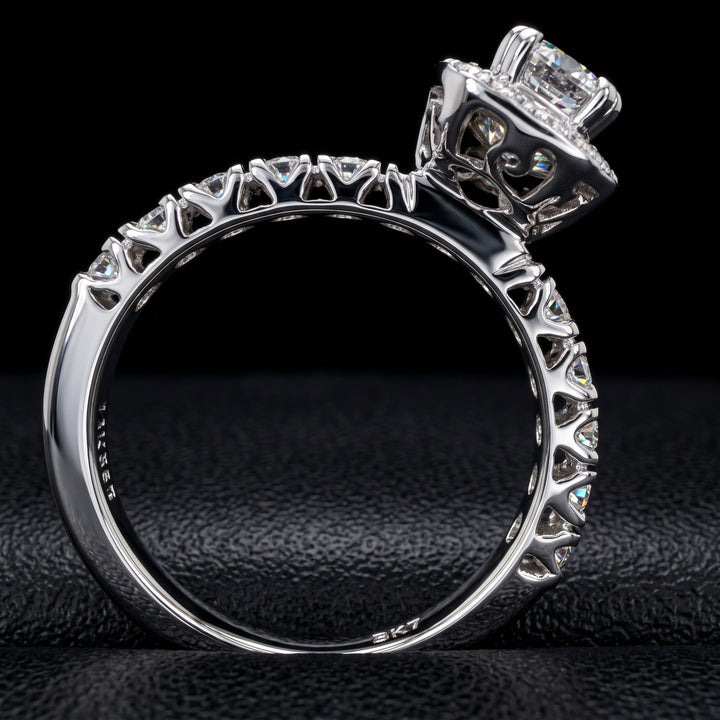 1.03 CT emerald-cut diamond halo engagement ring in 14K white gold with natural diamond accents.