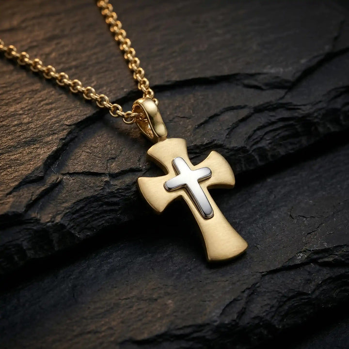 Layered Pattee Two-Tone Gold Cross Pendant on stone