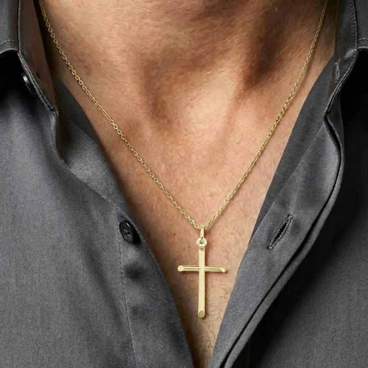 Tubular Latin Yellow Gold Cross Pendant worn on mens chest