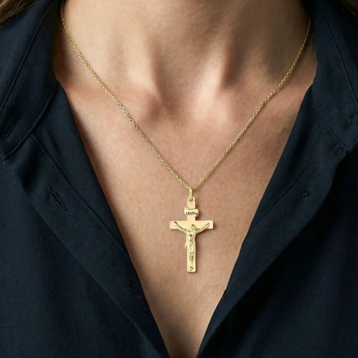 Latin Crucifix Yellow Gold Cross Pendant worn on womens chest